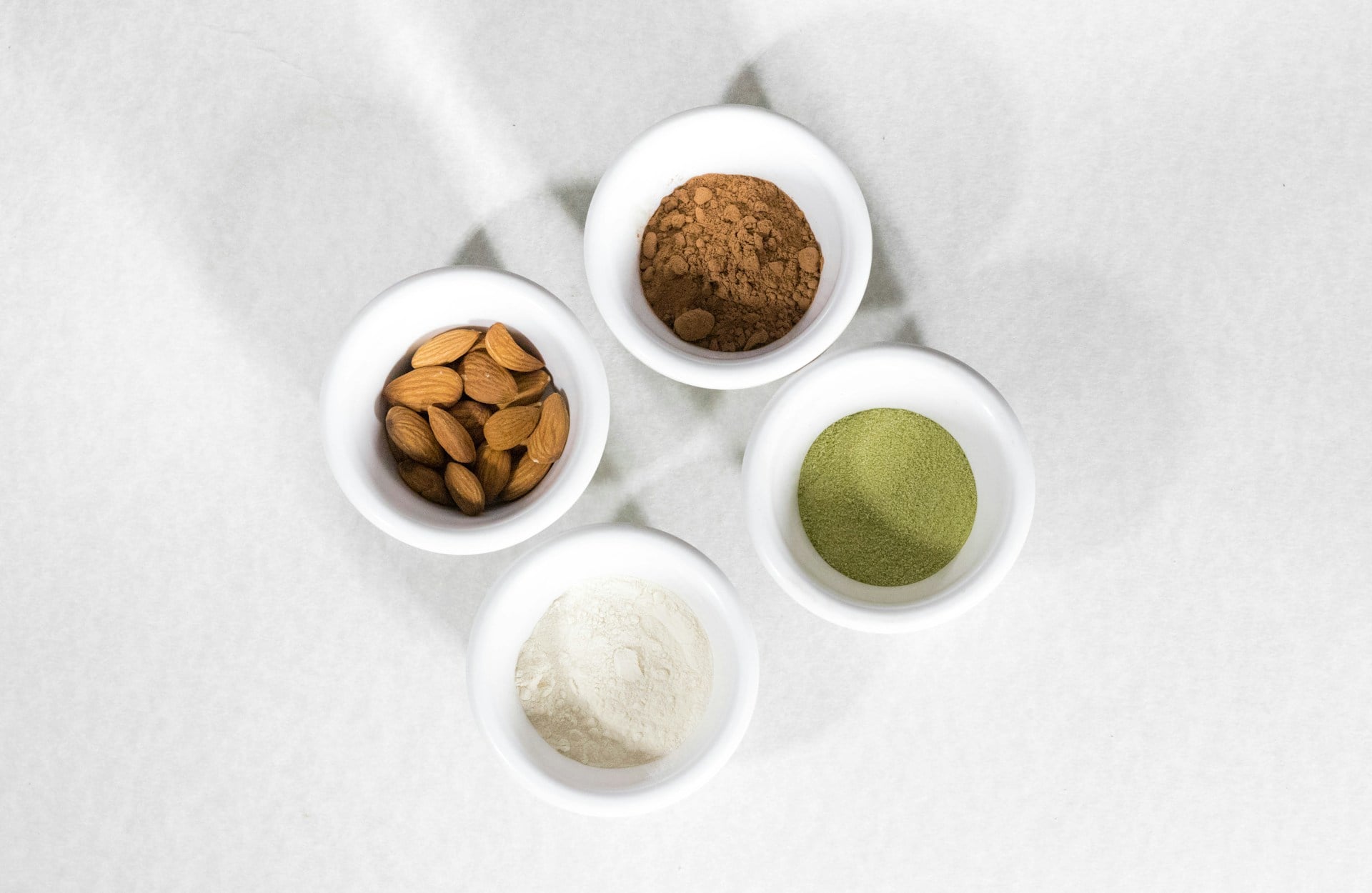 bowls with spices and food